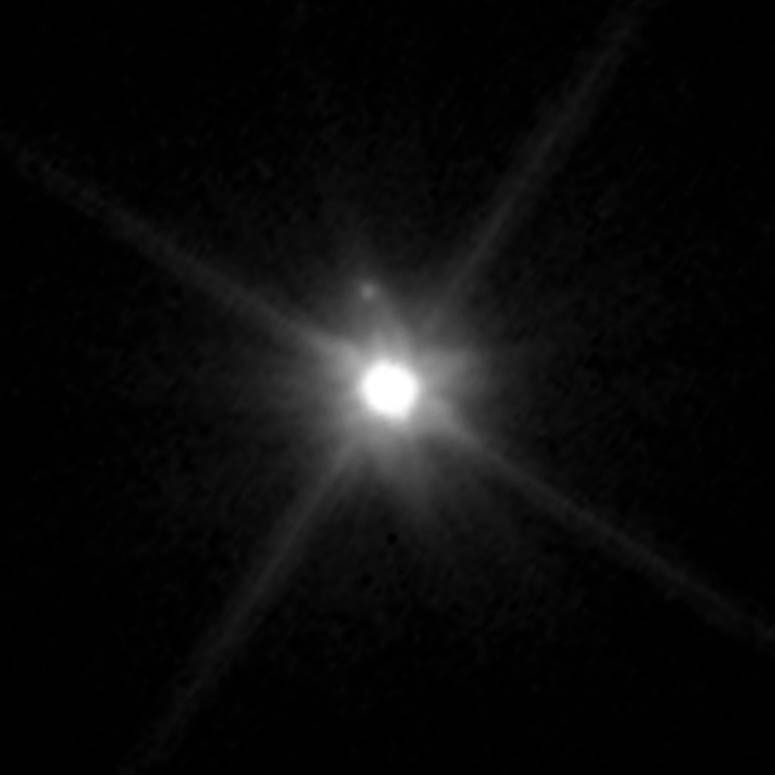 Foto av Makemake och dess mne taget av Hubble